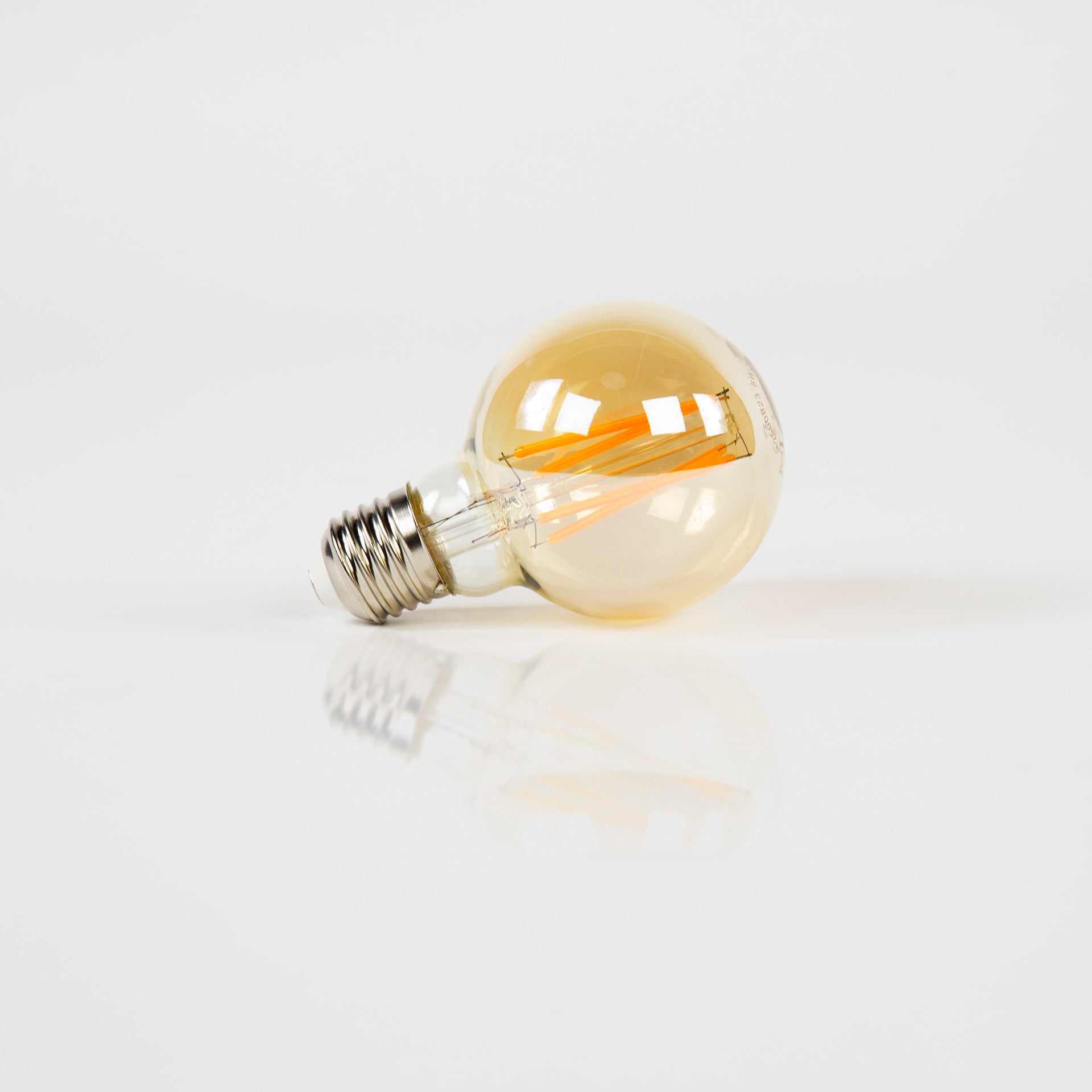 LED Filament Globus G70 Ø7 cm E27 – dimmbar 6W, 2100K extra warmweiß, 450 lm, Amber-Glas