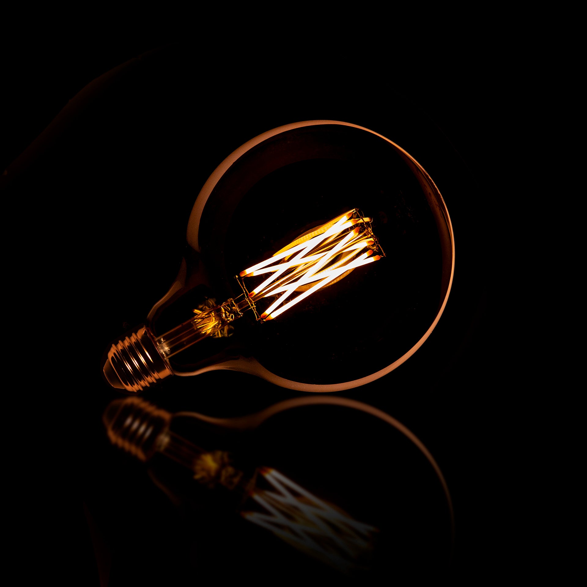 LED Filament Globus G125 Ø12,5 cm E27 – dimmbar in Amber & Rauchgrau, 6W, 2100K/2700K, 450/270 lm